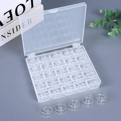 Sewing machine bobbins clear - bobbins,