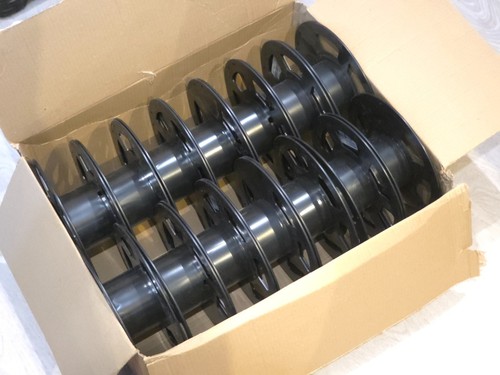 Empty plastic spool - empty,